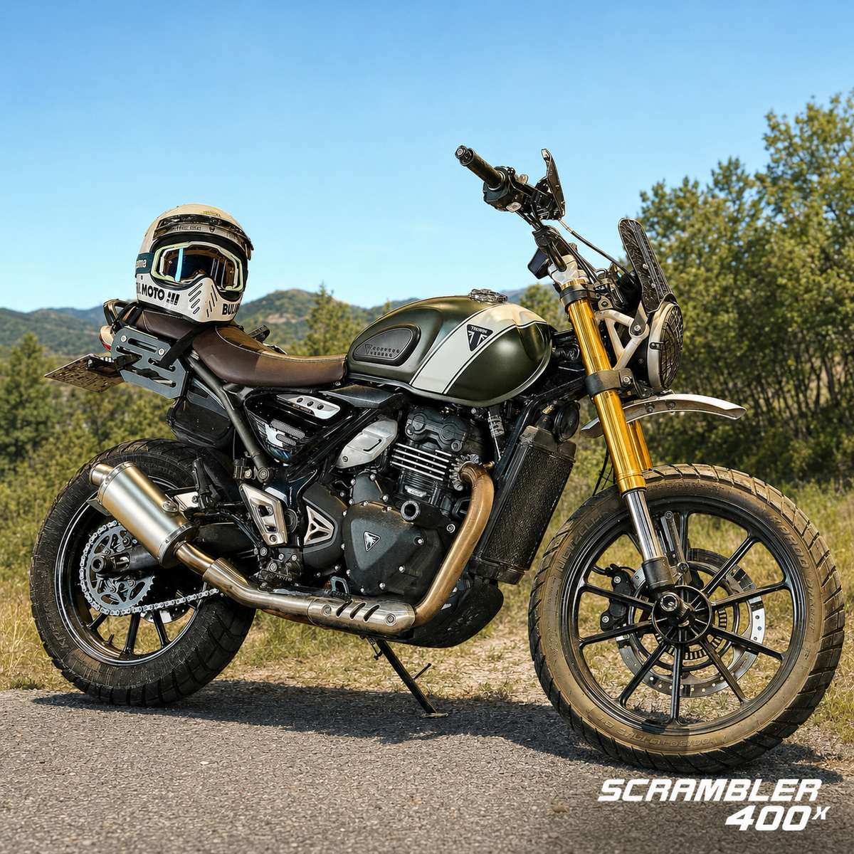 Triumph Scrambler 400 X clean slip-on exhaust installed outdoors