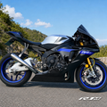 Yamaha YZF-R1M clean titanium exhaust full side view outdoors